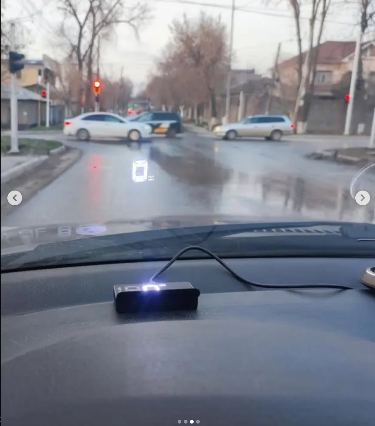 Speedometer that reflects on the glass, white, and is powered by USB.